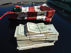 Marijuana and more than $11,000 in cash found during a traffic stop were seized for asset forfeiture proceedings. - PHOTO COURTESY OF EUREKA POLICE DEPARTMENT.
