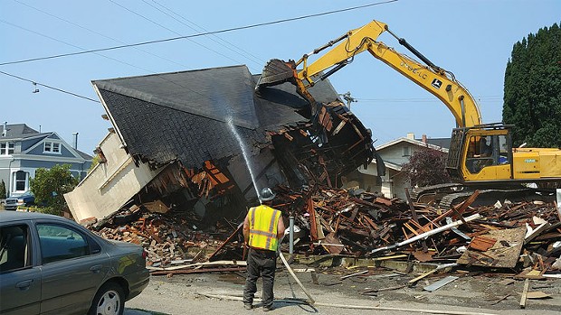 The city tears down a house owned by the Squireses on H Street. - COURTESY OF CITY OF EUREKA