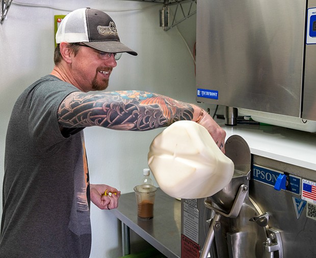 Shawn Powers whips up a batch of cinnamon ice cream.