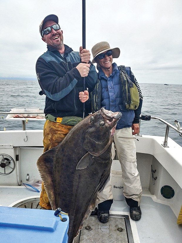 Chico residents Mike and Christina Plummer are all smiles after landing a large halibut aboard the Reel Steel last Friday. Christina's catch weighed in at 84 pounds and is the current leader in Englund Marine's halibut contest.