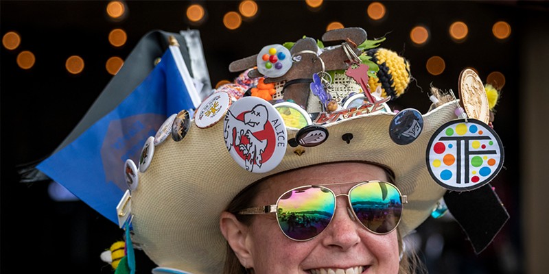 Ladies Hat Day 2024 Alice Pitt of Manila reconfigured many elements from her huge collection of Kinetic Grand Championship Race memorabilia into a design on her straw hat for this year's Ladies Hat Day at the Races event. Photo by Mark Larson