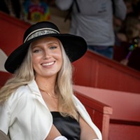 Ladies Hat Day 2024 McKenna Andrews of McKinleyville chose not to participate in the Ladies Hat Day competition and enjoyed watching the horse races from the grandstands in her stylish look. Photo by Mark Larson