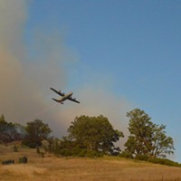 A plane helps battle the Eel Fire.