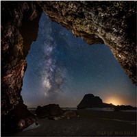 The Milky Way rises from the horizon near the glow of the setting crescent moon outside of this hidden Houda Beach cave. Camel Rock’s silhouette is large on the horizon beside the glow of the setting crescent moon. Humboldt County, California. September 13, 2018.