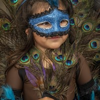 This young girl rocked maximum plumage with her beautiful peacock costume.