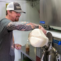 Shawn Powers whips up a batch of cinnamon ice cream.