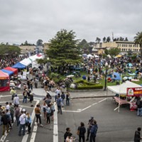 Thousands gathered on the Arcata Plaza to stand in line to buy oysters, listen to music or have a picnic on the grass.