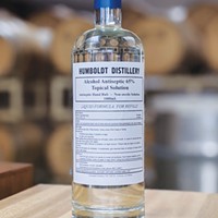 Humboldt Distillery's hand sanitizer donated in repurposed vodka bottles.