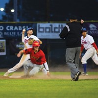 Crabs shortstop Aaron Casillas throws the ball over to first base after making the play at second for an out while facing the Alaska Goldpanners on Aug. 4 at Arcata Ball Park.