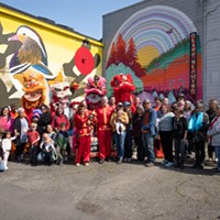 Members of the Eureka Chinatown Project and other supporting community members gather with the Lion Dancers at the dedication and ribbon cutting ceremony for Charlie Moon Way in Eureka.