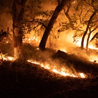 Firefighters defended houses at the end of Enchanted Creek Lane in September of 2021.