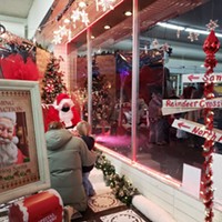 Santa at Discovery Shop at a past Henderson Center Holiday Open House.