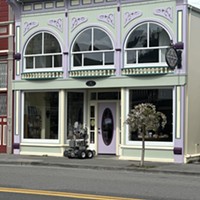 The Humboldt County Sheriff's Office bomb squad robot approaches the book store on Main Street.