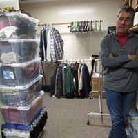 Roger Golec stands in front of HCOE’s resource closet.