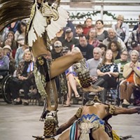 A packed house at Redwood Acres watched the eagle and jaguar dance by Aztec Dance and Drum group.