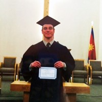 Jason Dale Johnson receiving his high school diploma last spring.
