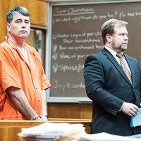 Gary Lee Bullock (above left) stands next to his attorney, Kaleb Cockrum, during his arraignment in 2014.