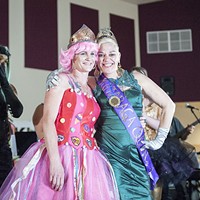 PoiSin Candie, left, celebrates being crowned the 2016 Rutabaga Queen with 2015 Queen Glorya Kiddnetica.