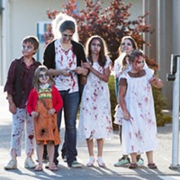 A zombie family out for a stroll. That's quality time.