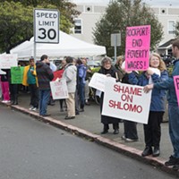 A recent protest in front of Partnership Healthcare.