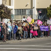A crowd of more than 200 pro-choice and pro-Planned Parenthood supporters carry signs, chant and wave to passing drivers on Fifth Street outside the Humboldt County Courthouse on Saturday afternoon.