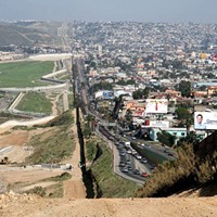 Border fence between San Diego's border patrol offices in California (left) and Tijuana, Mexico (right)