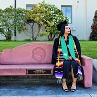 Rosibeth Cuevas, 21, sits on a bench that was dedicated to those who died in a 2014 bus crash in Orland. A survivor of the crash, Cuevas is now graduating from Humboldt State University.