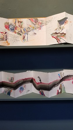 PHOTO BY GABRIELLE GOPINATH - Artworks by Laura Corsiglia. Above: "Drawing in the Shape of a Book: Silver Brother," 2018, ink, pencil, color pencil on paper with ink on paper covers (detail). Below: Detail of "Book of passage: Perch," 2019, ink, pencil, color pencil on paper with ink on paper covers.