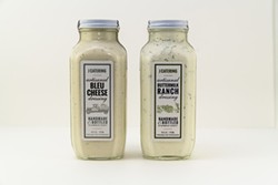 PHOTO BY ZACH LATHOURIS - J Catering bleu cheese and buttermilk ranch dressings.