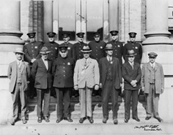 PHOTO COURTESY OF THE HUMBOLDT COUNTY HISTORICAL SOCIETY - Eureka Police Department employees &mdash; including Chief George Littlefield, first row, third from right &mdash; pose in front of Eureka City Hall.