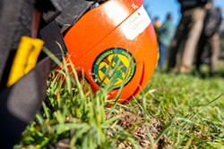 PHOTO COURTESY OF CAL POLY HUMBOLDT - A Cal Poly Humboldt forestry student's helmet sits at the site of a controlled burn near Honeydew last year.