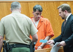 Gary Lee Bullock, pictured here at his arraignment with his attorney Kaleb Cockrum (right), was sentenced to serve life in prison without the possibility of parole for the Jan. 1, 2014 murder of St. Bernard pastor Eric Freed. Photo by Mark McKenna
