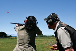 AMY BARNES - Taking aim with Ron Ruchong.