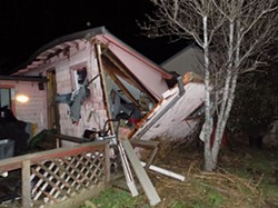 COURTESY OF HUMBOLDT BAY FIRE - The force of this butane hash lab explosion outside of Eureka knocked the house off its foundation and lifted the roof off the walls.
