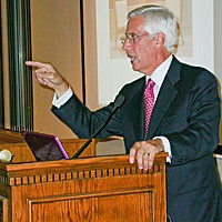 Umpqua Holdings Corporation President and CEO Ray Davis speaks at the Wharfinger building last week. Photo by Ryan Burns